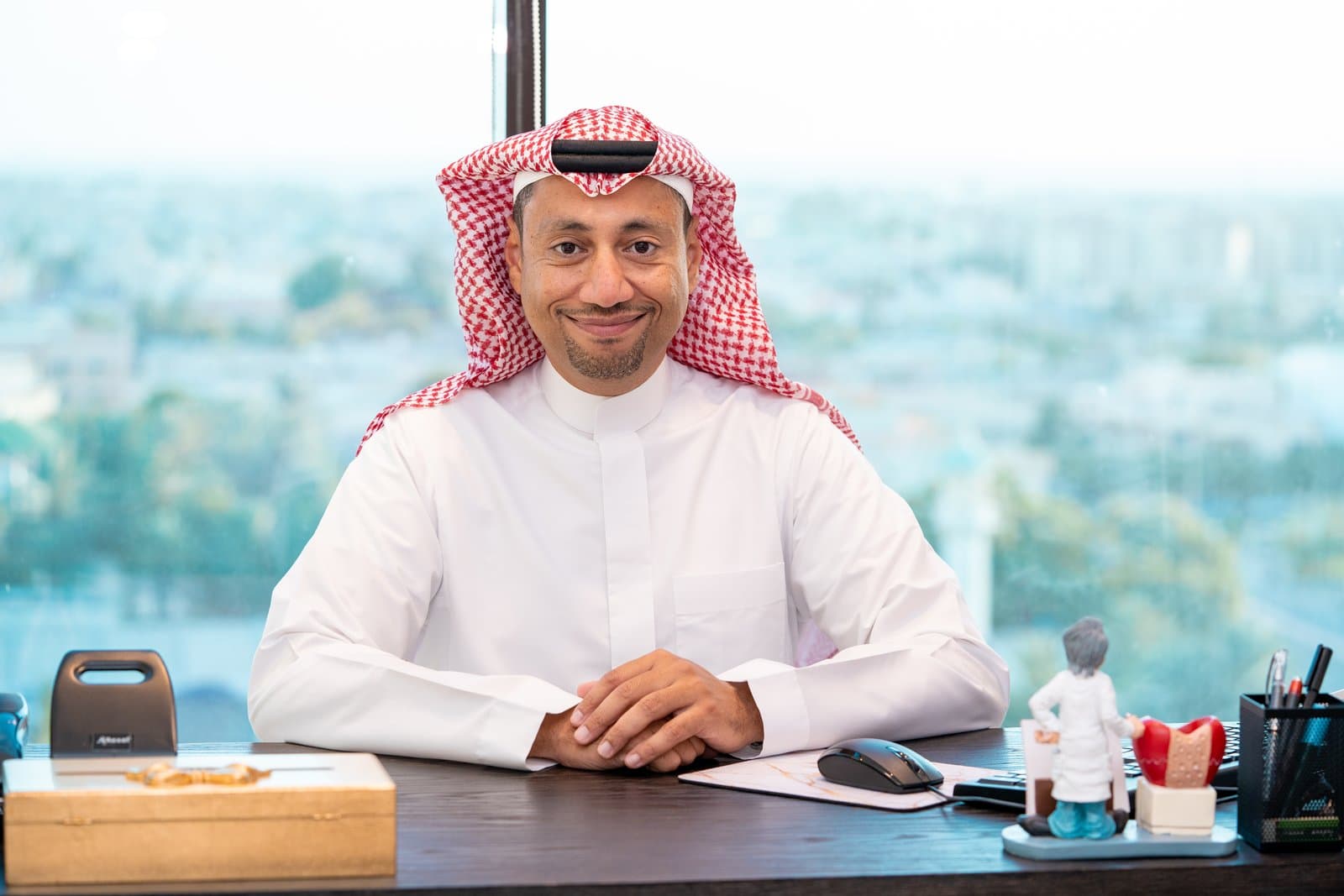 Consultation setting with Dr. Raed